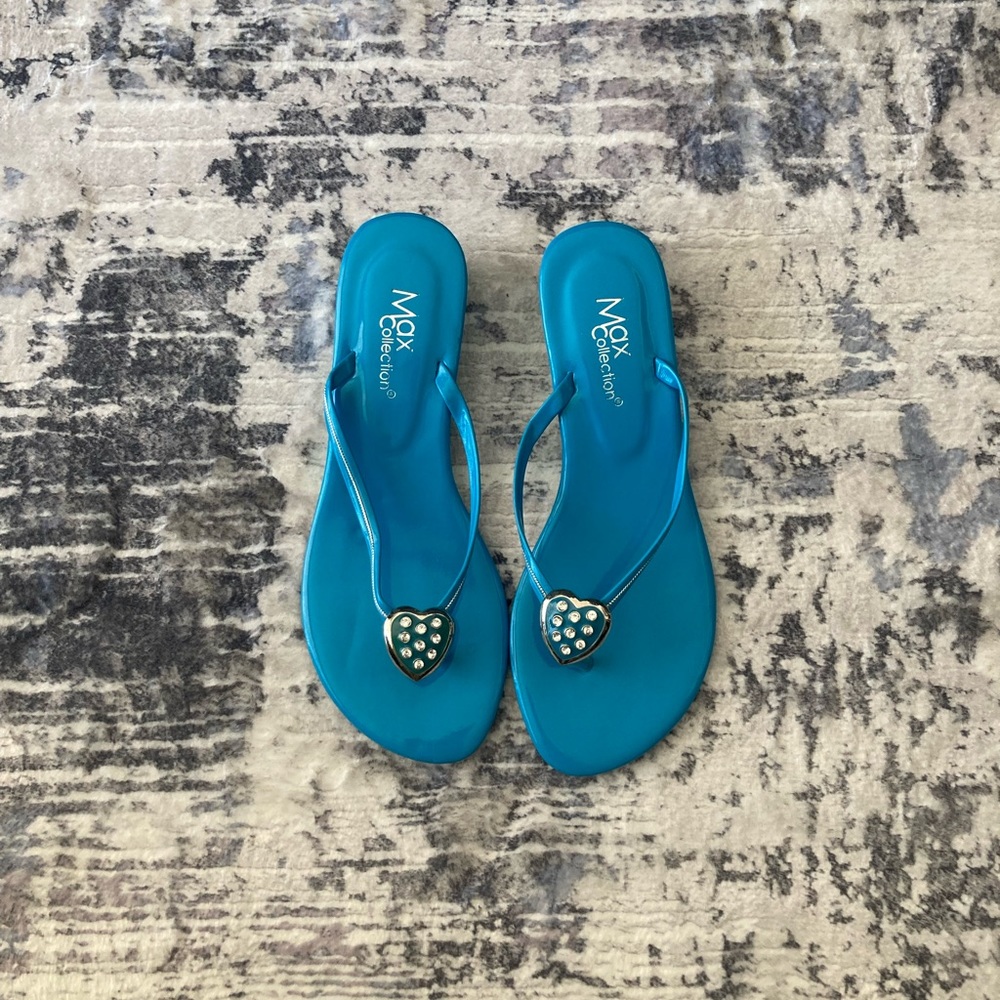 Max Collection Turquoise Wedge Thong Sandals
Size 6